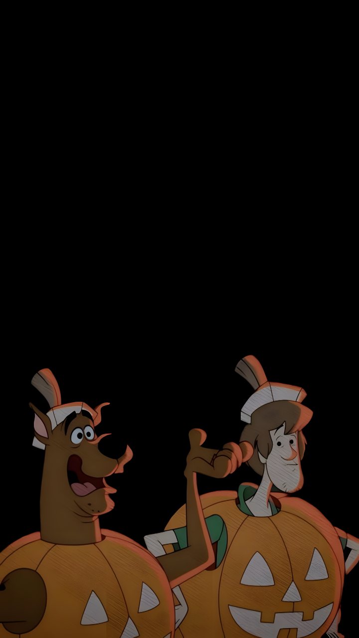 Cartoon knight and smiling horse wearing pumpkin armor appear near the bottom of a black phone wallpaper.