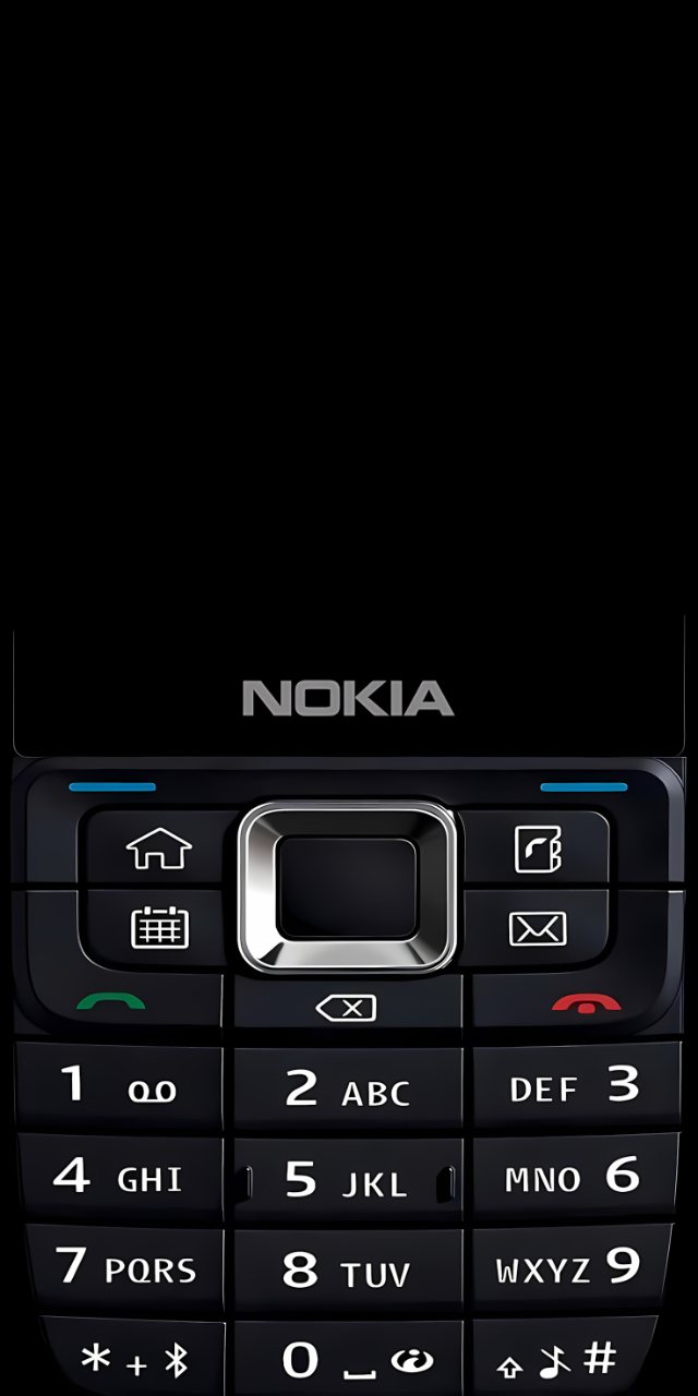 Close-up of a classic black Nokia mobile phone keypad with silver controls, blue accents, white symbols, and numbered buttons.