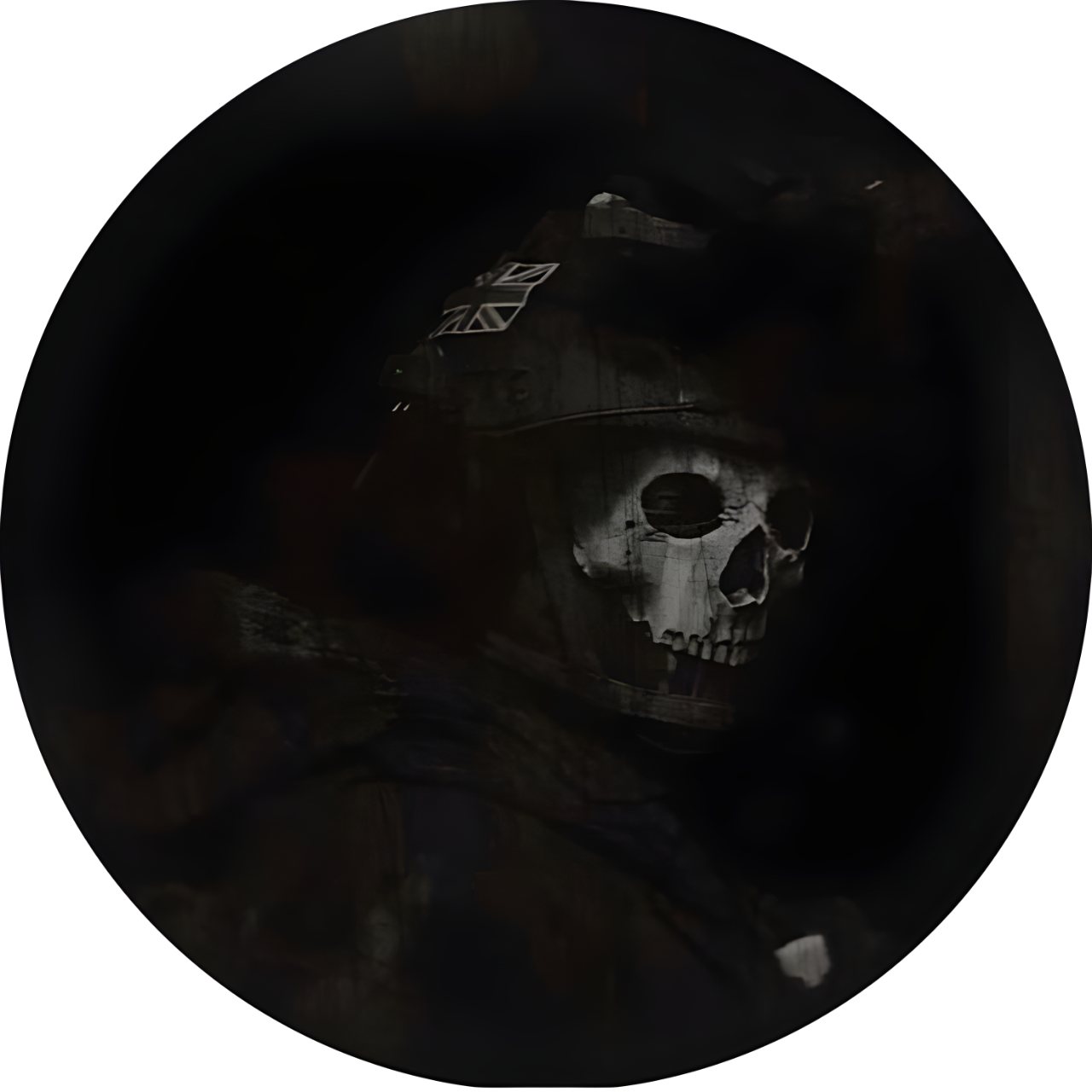 A dark circular profile picture showing a shadowy soldier wearing a skull mask, with faint metallic details against a nearly black background.
