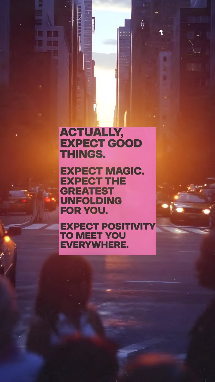 Blurred city street at sunset with a pink panel reading, “Actually, expect good things. Expect magic. Expect the greatest unfolding for you.”