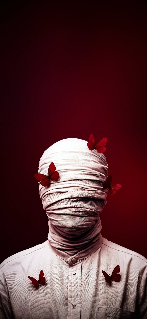A bandage-wrapped figure with no visible face stands against a deep red background, surrounded by several vivid red butterflies.