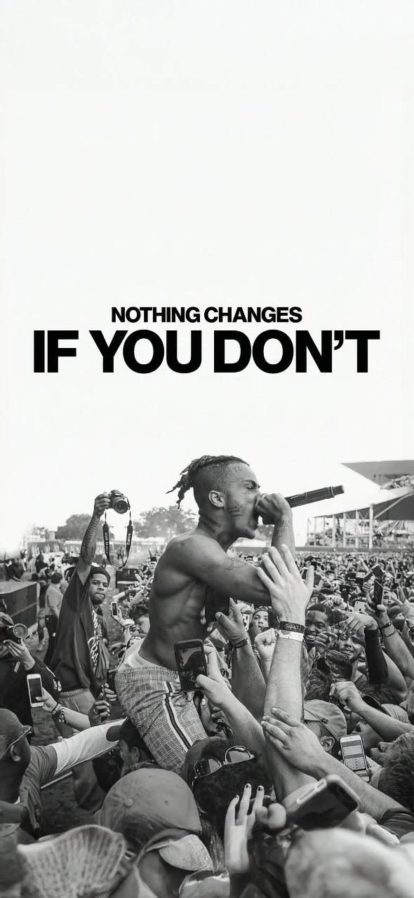Black-and-white photo of XXXTentacion performing to a crowded audience beneath the text “NOTHING CHANGES IF YOU DON’T.”